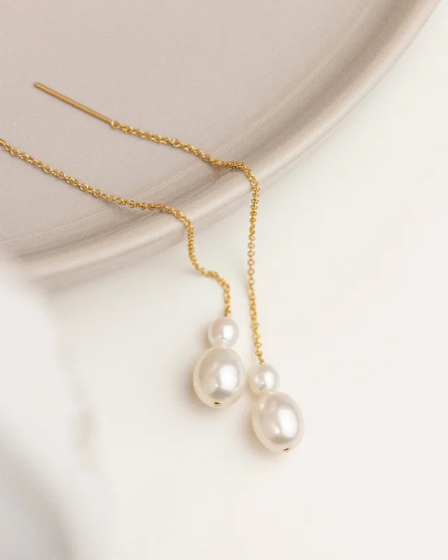 Hoop earrings with cut-out designs for a creative and lightweight effect-Threaded Pearl Earrings