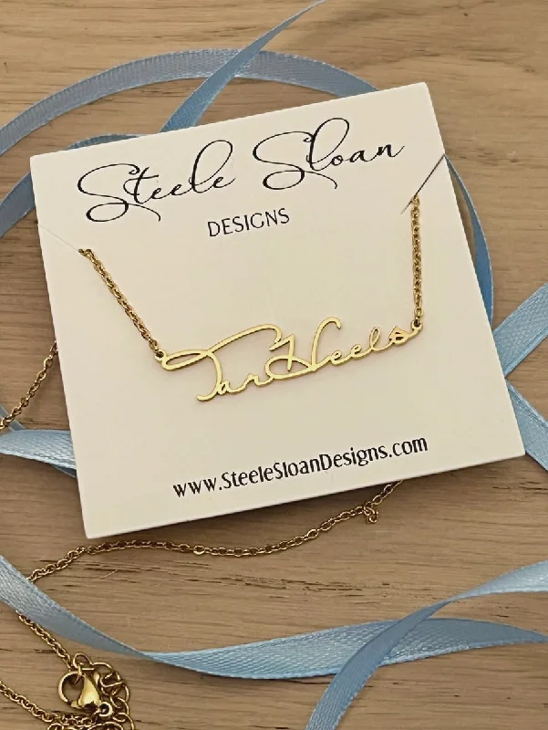 High-heeled sandals for women with cross-strap design and open-toe look for evenings-Tar Heels Gold Cursive Necklace by Steele Sloan Designs